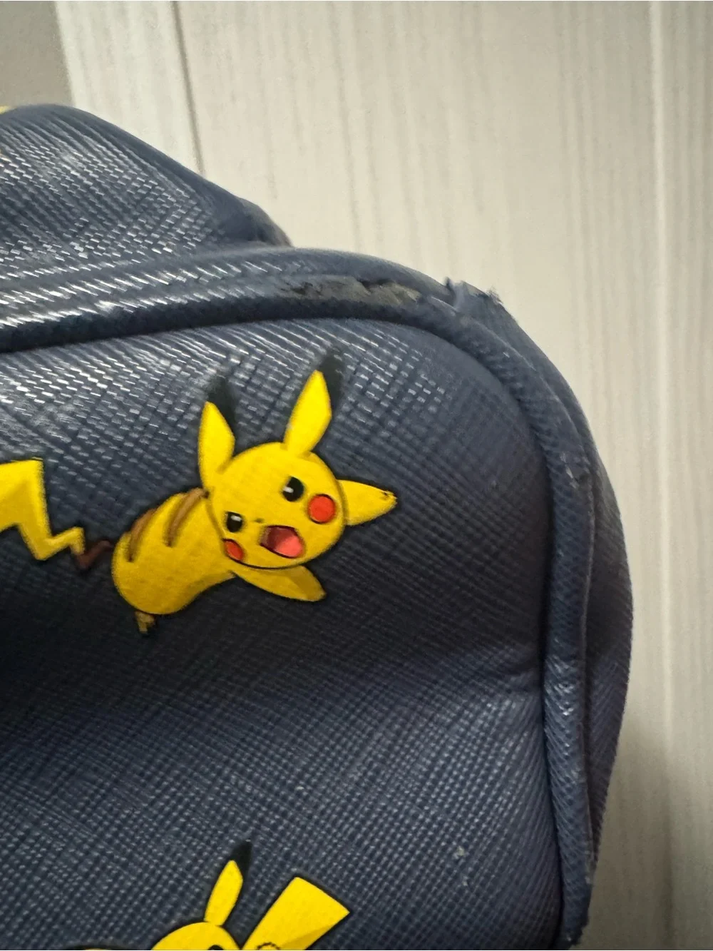 Loungefly Navy Mini Backpack with Yellow Pikachu Print